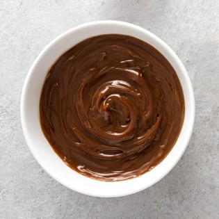 A jar of dulce de leche, the base of the desserts with dulce de leche served at Sabores del Plata
